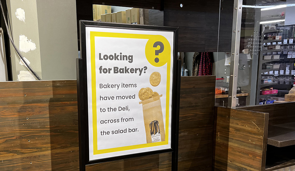 Sign directing customers to find new bakery location at Willy Street Co-op East