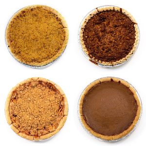 Four pies: cherry, pecan, apple, and pumpkin