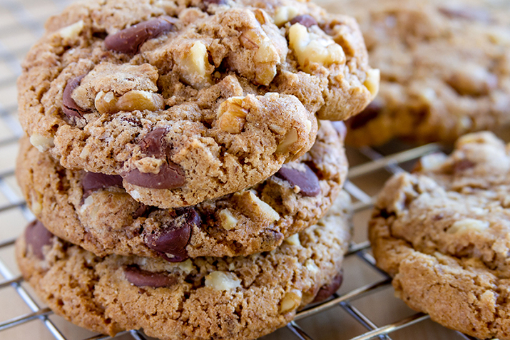 Chocolate chip cookies on a drying rack