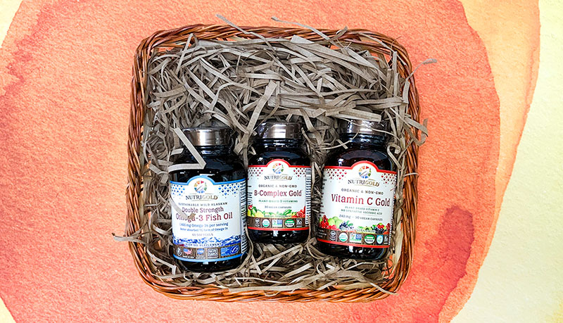 Three bottles of nutritional supplements in a basket