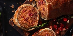 Meatless roast en croute on a cutting board