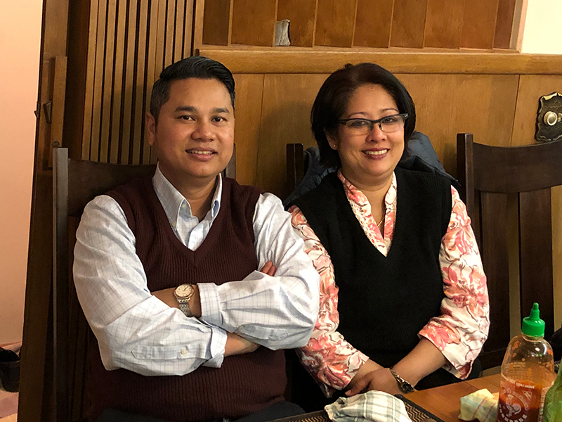 Two people sitting at a table