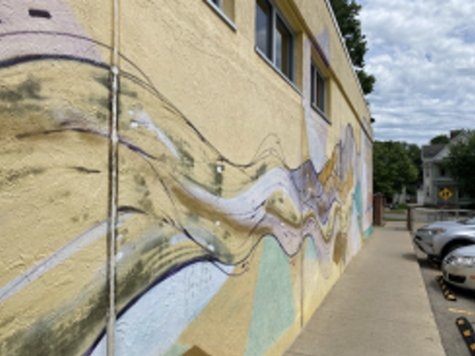 angled shot of the mural along the Willy Street Co-op East location